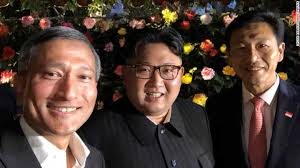 Image result for kim jong un pic with singapore ministers gif