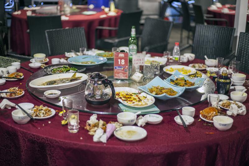 dadonghai-bay-dirty-dishes-table-restaurant-food-waste-china-hainan-island-dadonghai-bay-decem...jpg