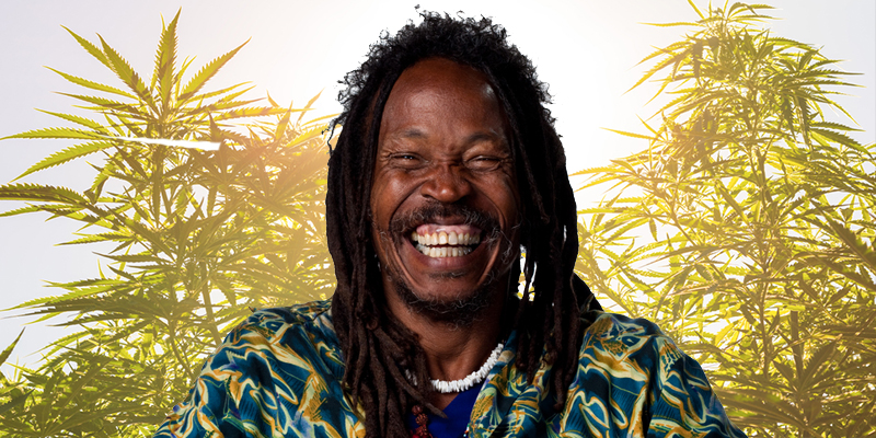 laughing-man-in-front-of-plants.jpg