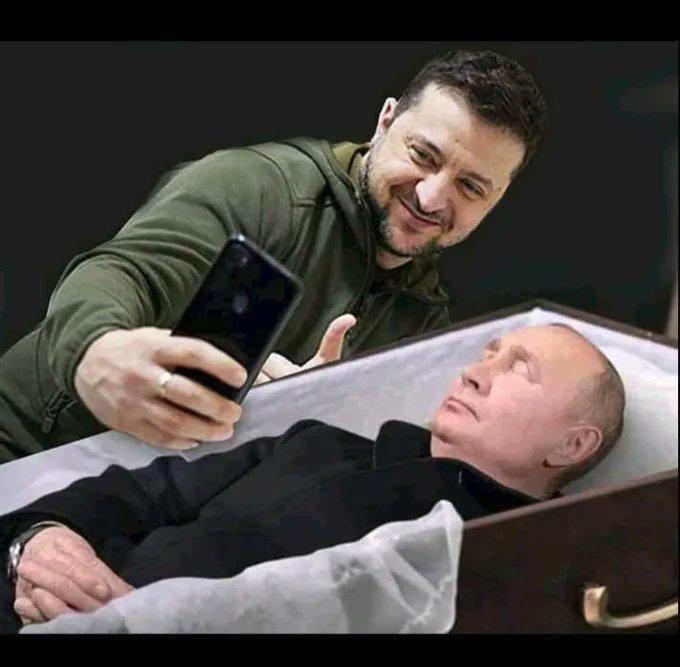 Putin In Coffin.jpg