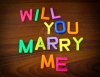 10526904-will-you-marry-me-in-colorful-toy-letters-on-wood-background.jpg