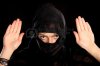 12911277-a-picture-of-a-young-arabic-woman-surrending-over-black-background.jpg