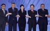 192664-asean-leaders-and-representatives-hold-hands-for-photo-session-during-.jpg