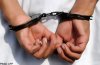 20120601.174741_afp_handcuff.jpg 20120601.174741_afp_handcuff.jpg
