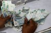 20121205.094900_reuters_pesos.jpg 20121205.094900_reuters_pesos.jpg