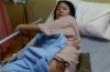 20130213_172740_msia_woman_stabbed.jpg